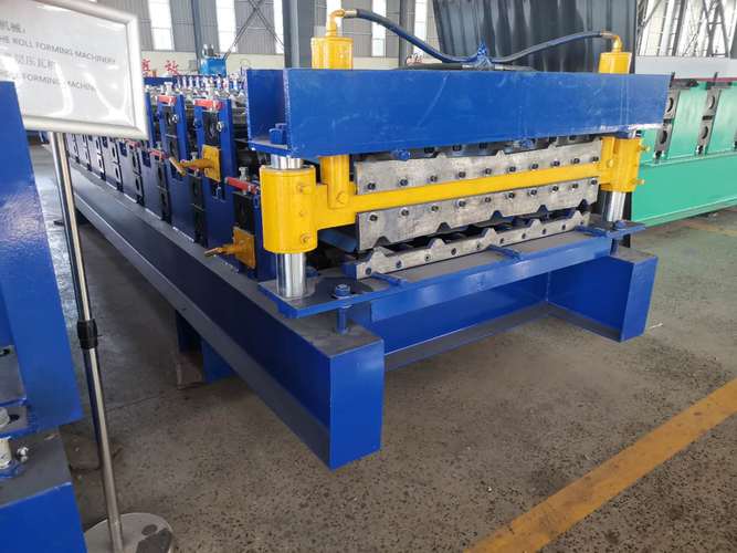 興和機械現(xiàn)貨銷售彩鋼840/900型全自動雙層壓瓦機 彩鋼夾芯板設(shè)備